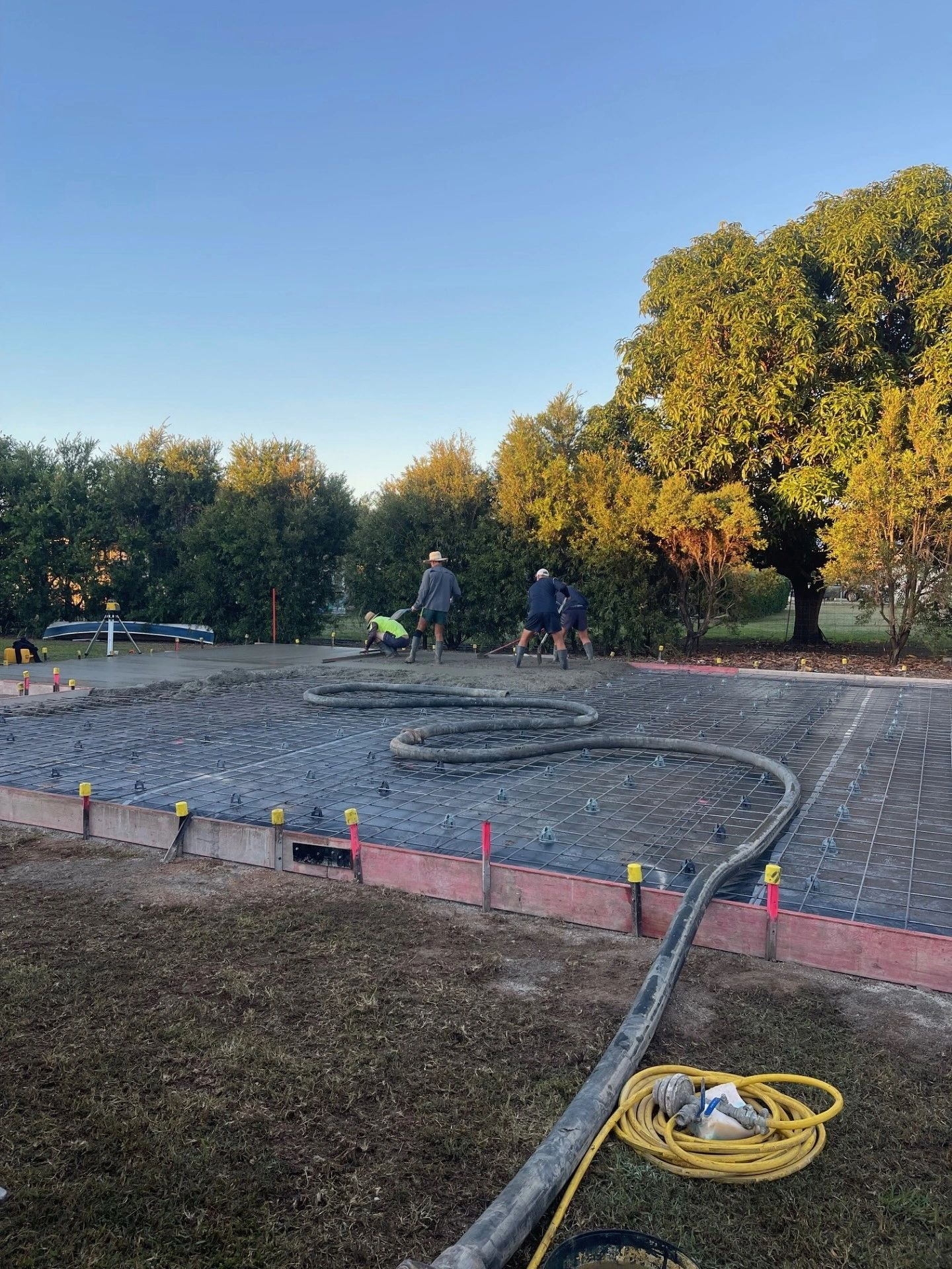 Concrete slab finishing with sun flare